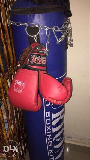 New boxing - one boxing bag filled, one hanging
