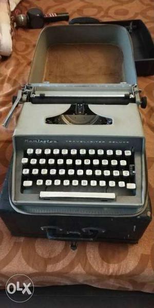 Portable typewriter with carry case