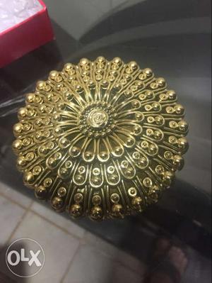 Round Gold-colored Ornament