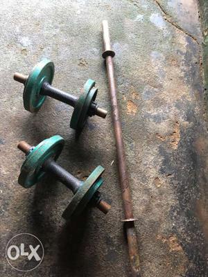 Two Green And Black Dumbbells