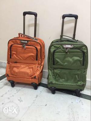 Two Green And Orange Softside Luggage Bags