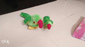 Two Green And Yellow Bird Plush Toys