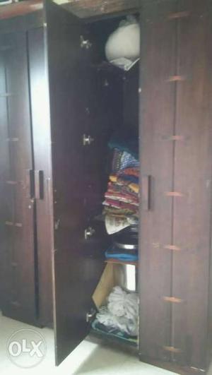 Two large heavy wooden cupboards.. urgent sell