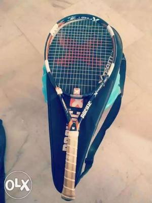 White And Black Tennis Racket With Black Bag