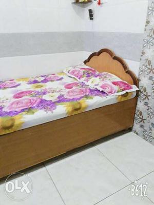 White And Multicolored Floral Bedspread