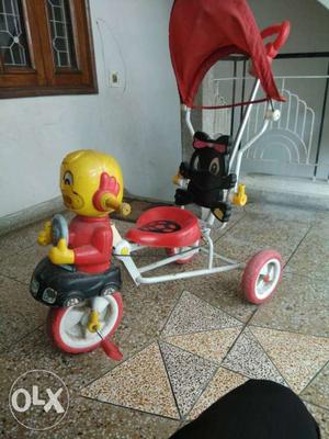 White, Red, And Yellow Pedal Trike