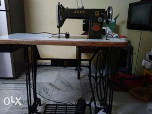 White Wooden Tabletop Black Juki Treadle Sewing Machine