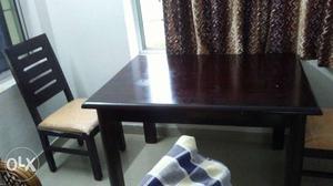 Wooden Dining Table with 4 cushioned wooden