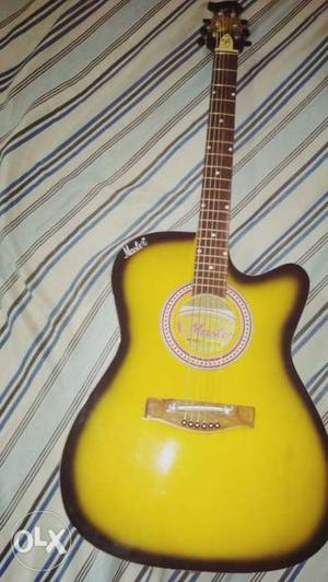 Yellow Burst Venetian-cutaway Acoustic Guitar In White And