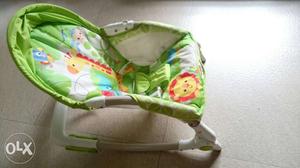 A Fisher Price rocker in excellent condition is