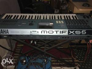 Black And Gray Yamaha Motif Xs6 Electronic Keyboard