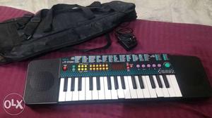Black Electronic Keyboard With Bag