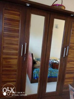 Four door cupboard in good condition.. please