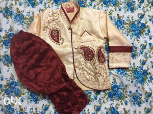 Mehroon colour traditional wear for baby boy.