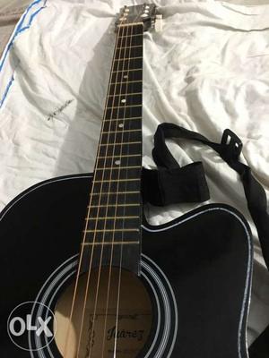 New condition 4 month old black guitar with uitar