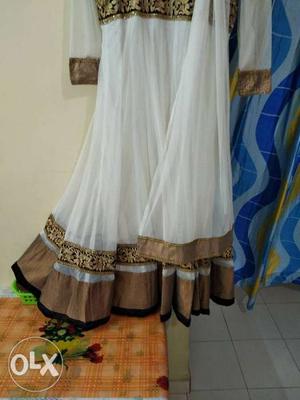 One time used..long anarkali net material with