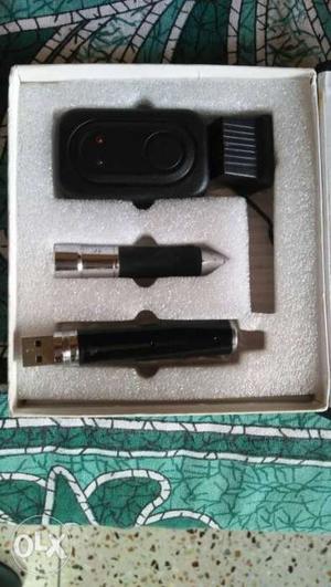 Pocket video camera with pen, charger, USB,