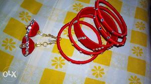 Red Knit Bangles And Pair Of Jhumkas