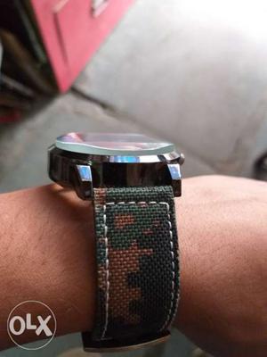 Silver-colored Watch With Black And Brown Band