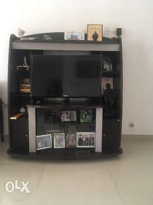 TV cabinet with small storage cupboard and
