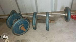 Two Blue Dumbbells And Barbell