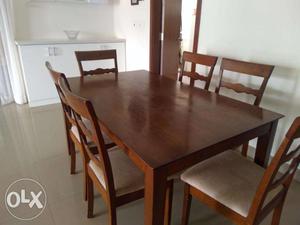 6 seater solid wood dining table
