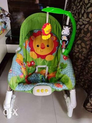 Baby's Green And White Fisher-Price Bouncer