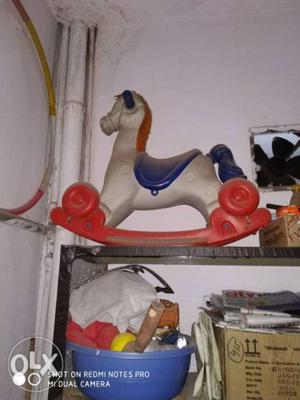 Children's White And Red Rocking Horse