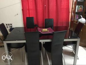 Godrej interio dining table with 6 chairs. 2