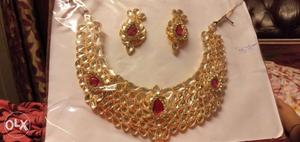 Gold-colored And Red Gemstone Necklace And Earrings