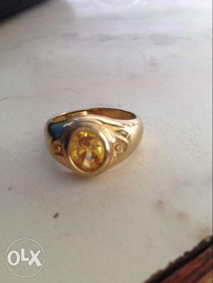 Gold-colored Yellow Gemstone Encrusted Ring