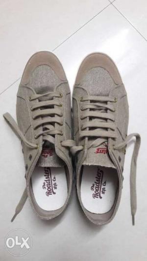 Only used one time, khaki colour, size 7