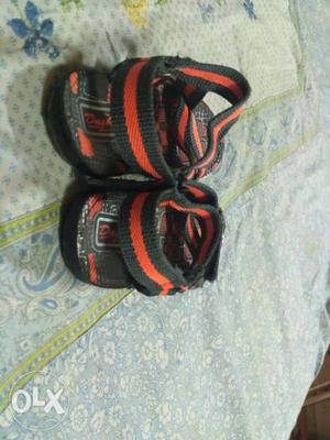 Pair Of Black-and-red Hiking Sandals