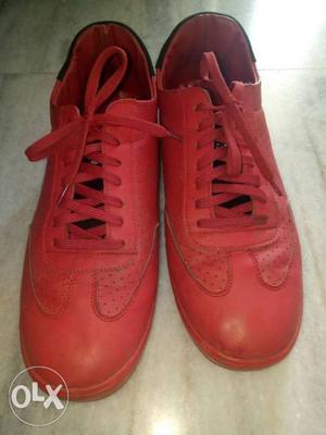 Pair Of Red Leather Low-top Sneakers