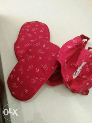 Red color, never used baby carrier available for