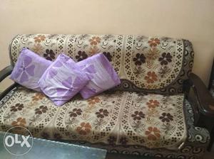 Sofa With cushion and cover.