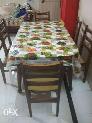 Teak wood dining table with 6 seater negotiable