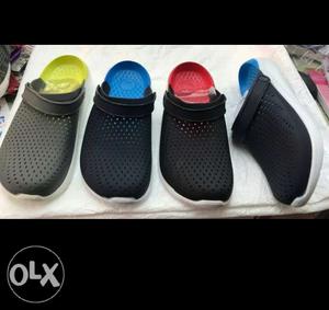 Three Pairs Of Black And Blue Slide Sandals