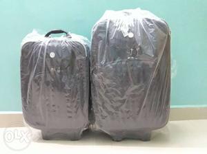 Two Black Softside Luggage Bags