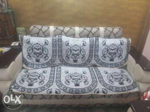 White And Gray Floral Padded Couch