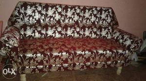 White And Red Floral Textile