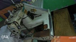 White Over-lock Sewing Machine