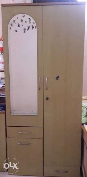 Wooden wardrobe with front mirror