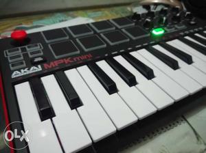 Black And White Akai MPK Mini Machine midi keyboard with