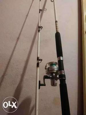 Black And White Fishing Rods With Spincast Reel