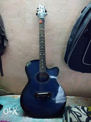 Blue And Black Acoustic Guitar