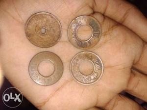 Four Round Brown Ching Coins