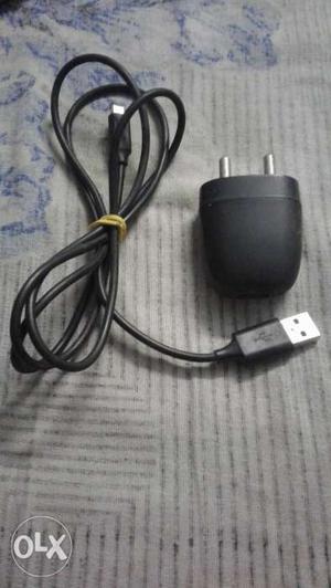 Original USB charger, 1 yr used.