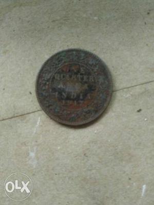 Round  Black 1/4 Indian Coin