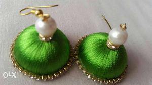 Green silk thread jhumki beaded with pearl.